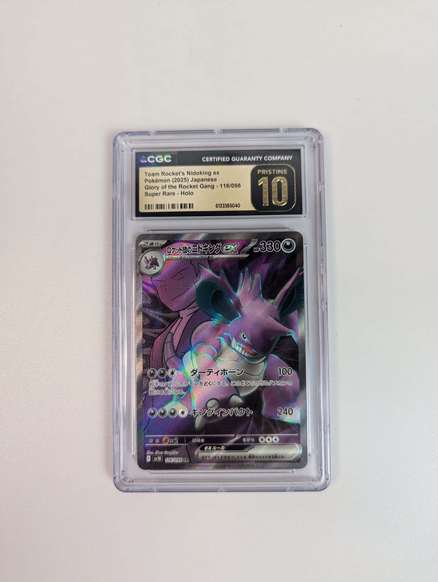 Pokémon trading card in a protective case with CGC Pristine 10 grading slab on a light gray background