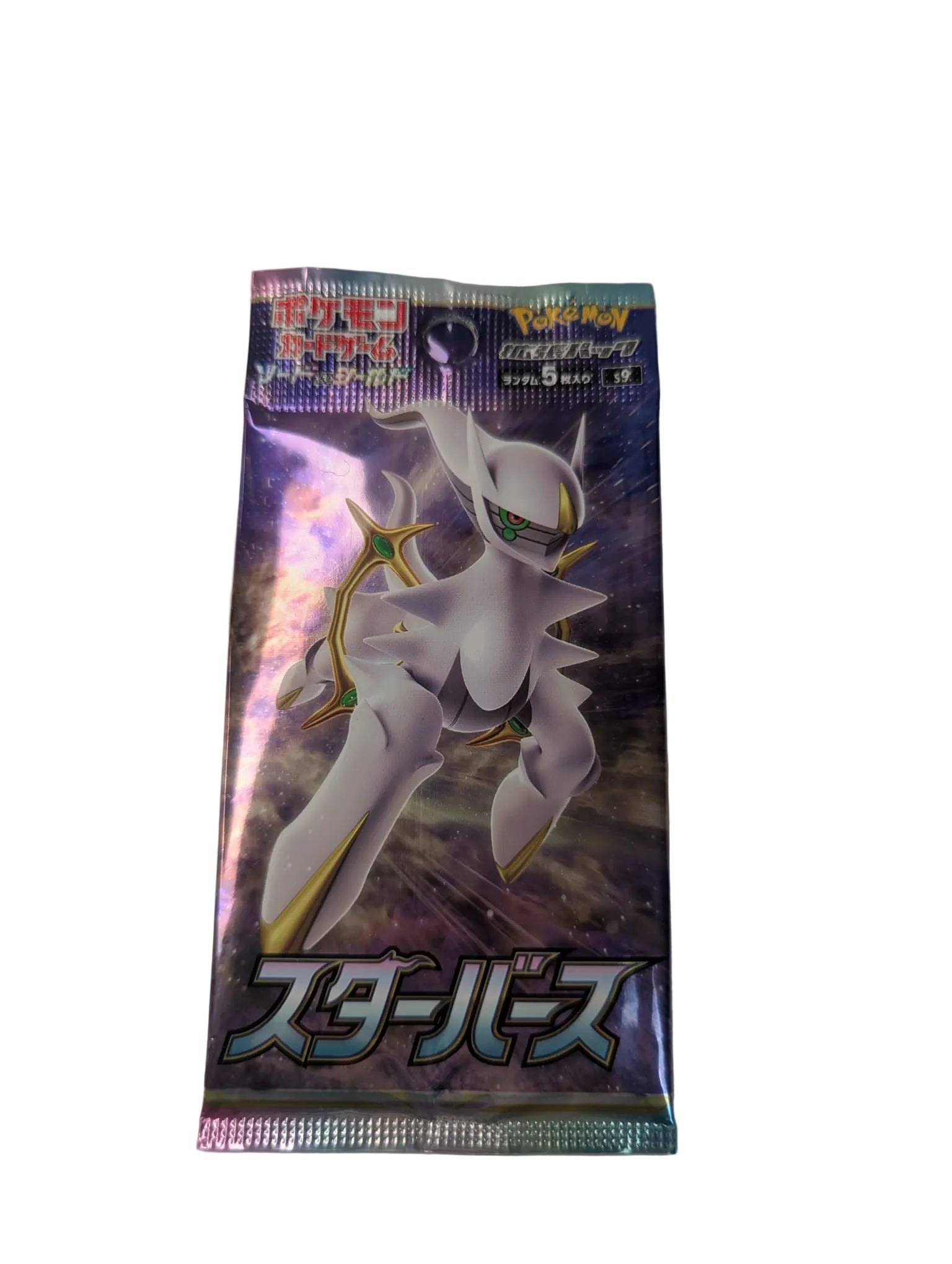 Pokémon trading card game booster pack featuring a Pokémon character on a gray background